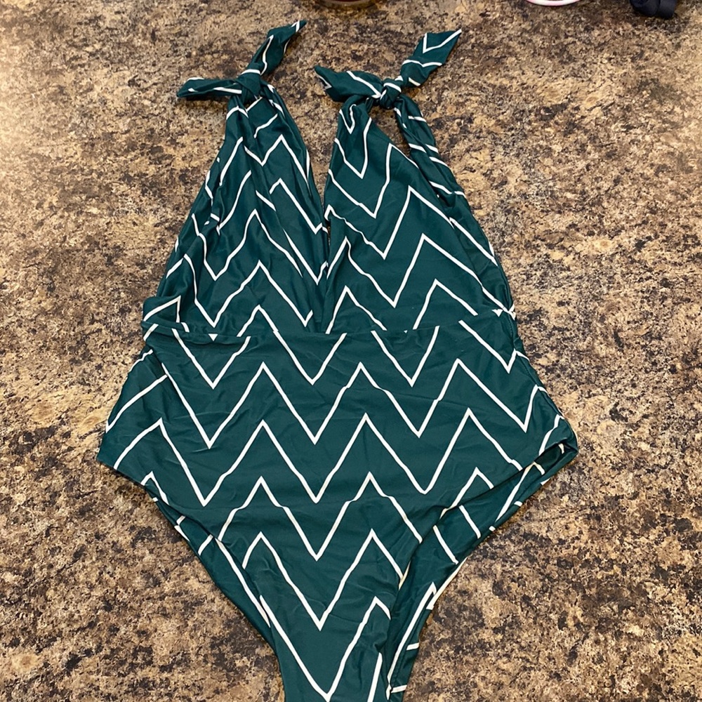 Women’s one piece swimsuit size medium it’s new without tags the liner is in it
